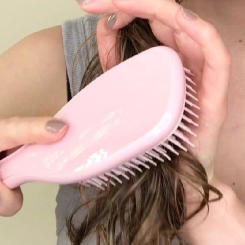 Scalp Deep Massager Comb infused with Aloe Vera.
