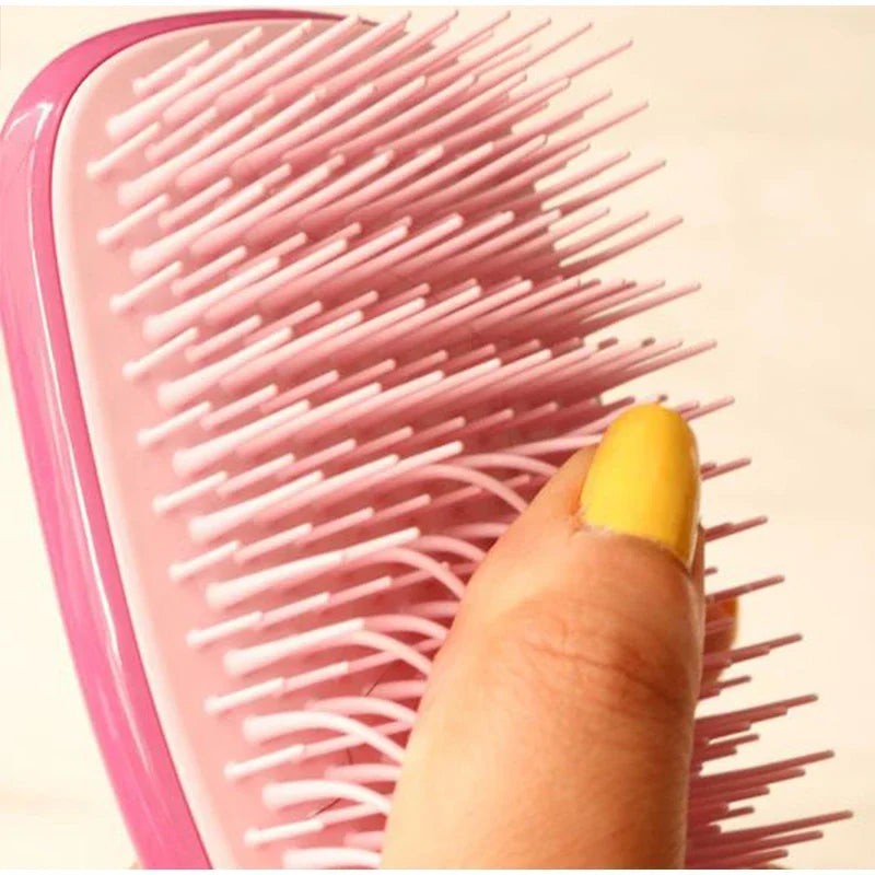 Scalp Deep Massager Comb infused with Aloe Vera.